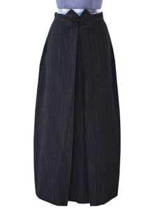 Front view of the pinstriped box skirt designed by Khumanthem Atelier