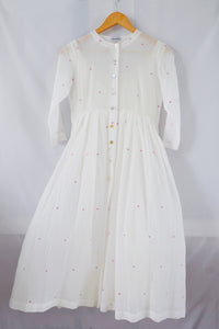 Hanger shoot of Handwoven Gathered hem quarter sleeves cotton dress, designed by Khumanthem Atelier