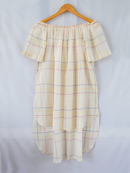 Hanger shoot Model wearing Handwoven Off-shoulder tunic with high-low hem, designed by Khumanthem Atelier, front view.