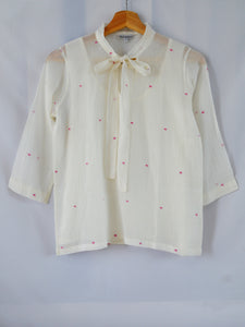 Front View of Hanger Shoot Handwoven Dainty Pink dots cotton blouse