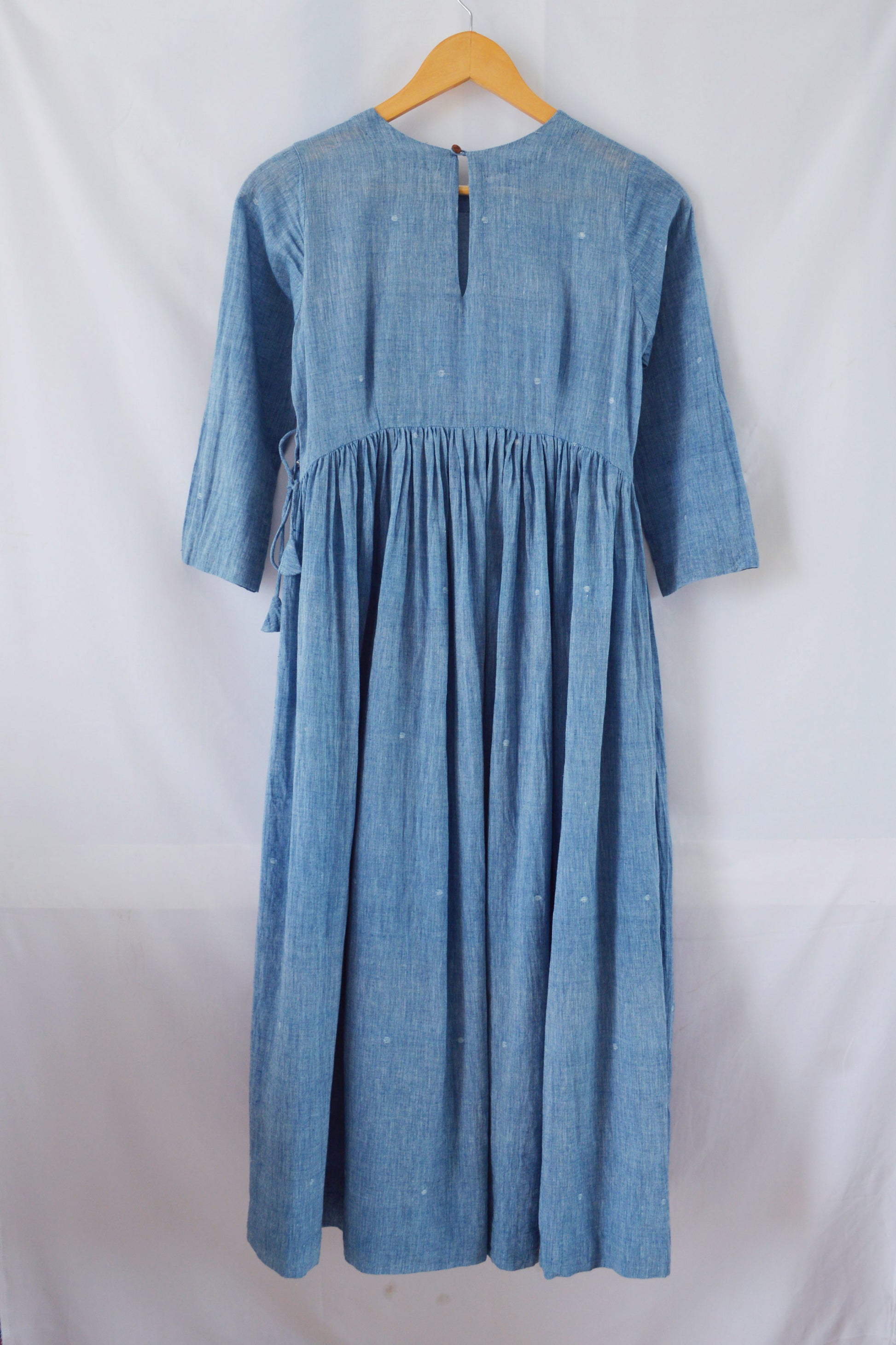 Back view of hanger shoot Handwoven Gathered waist cotton dress, designed by Khumanthem Atelier
