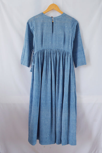 Back view of hanger shoot Handwoven Gathered waist cotton dress, designed by Khumanthem Atelier